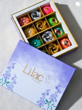 Lilac Mithai Studio Instagram post: Lavender Lilac gift box with assorted mithai